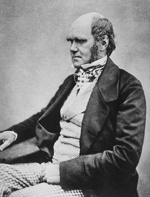 Charles Darwin seated